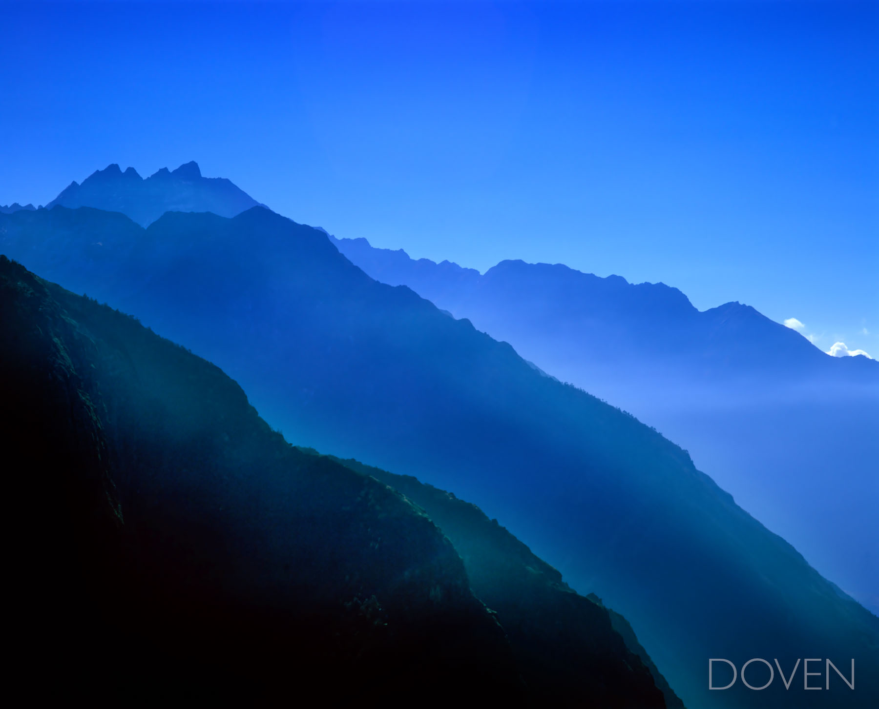 Everest Valley Stunning blue layered mountain ridges in Nepal near Mount Everest. We went to Everest base camp, gazed upon the highest mountain...