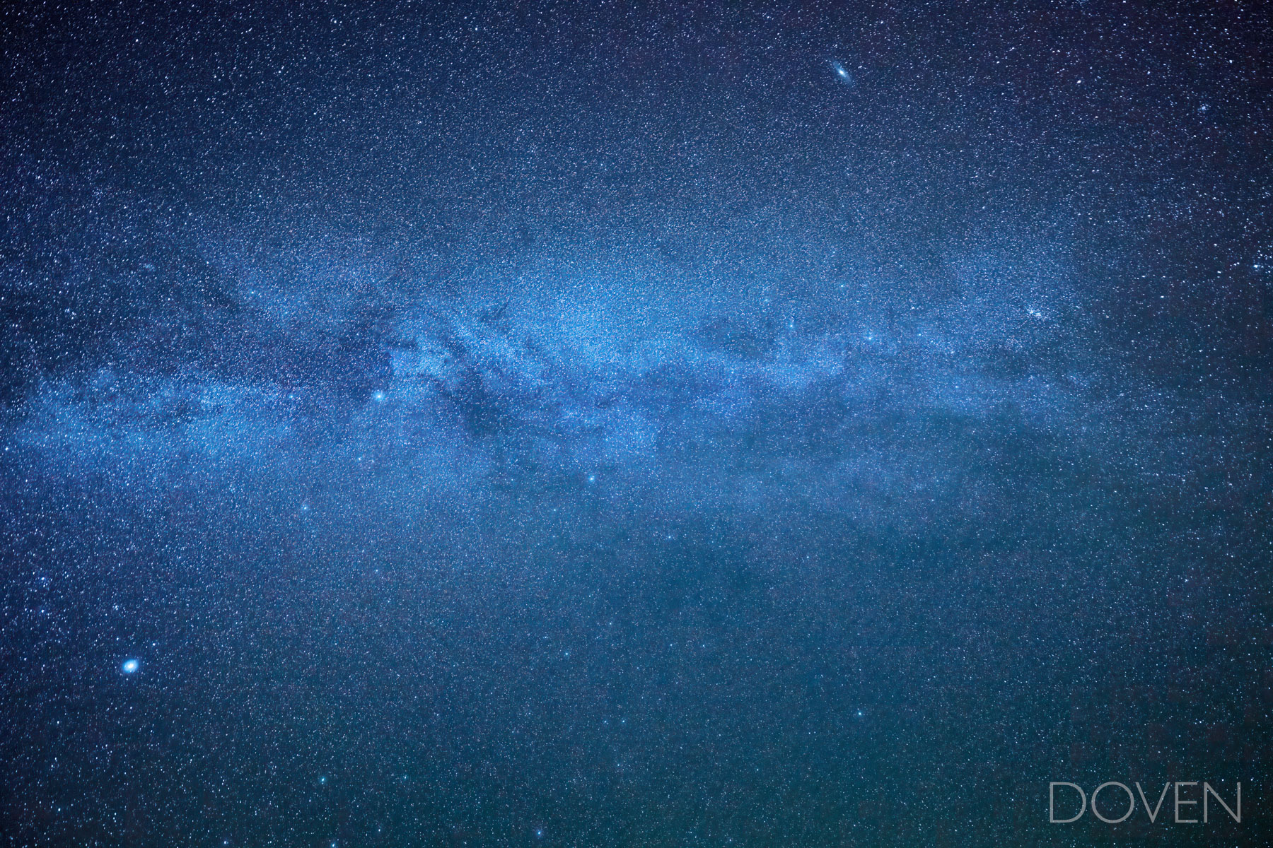 Interstellar The Milky Way Galaxy with millions of stars against the deep blue night sky. Camping out on top of Hunt's Mesa, in Monument Valley...