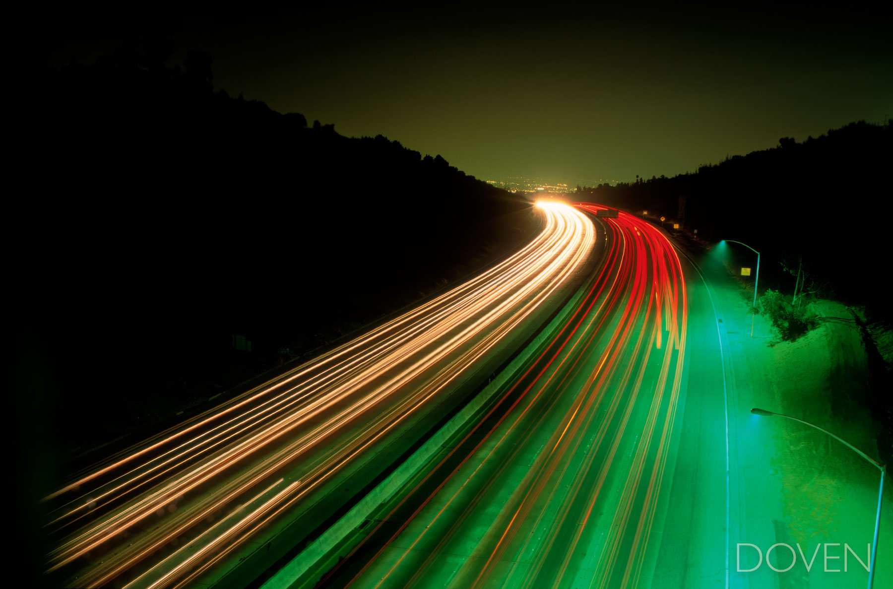 The 405 Freeway shot on film at night with a tripod on an overpass bridge at Mulholland Drive to capture the streaks of head...